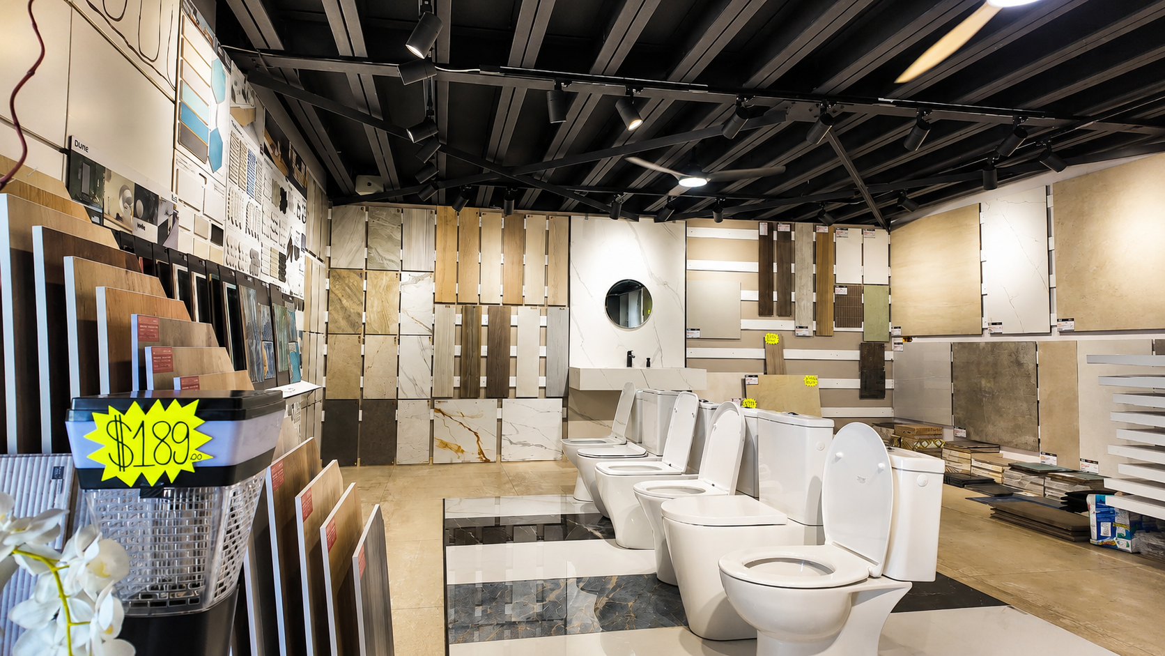 Tile sample wall with sanitary fixtures display